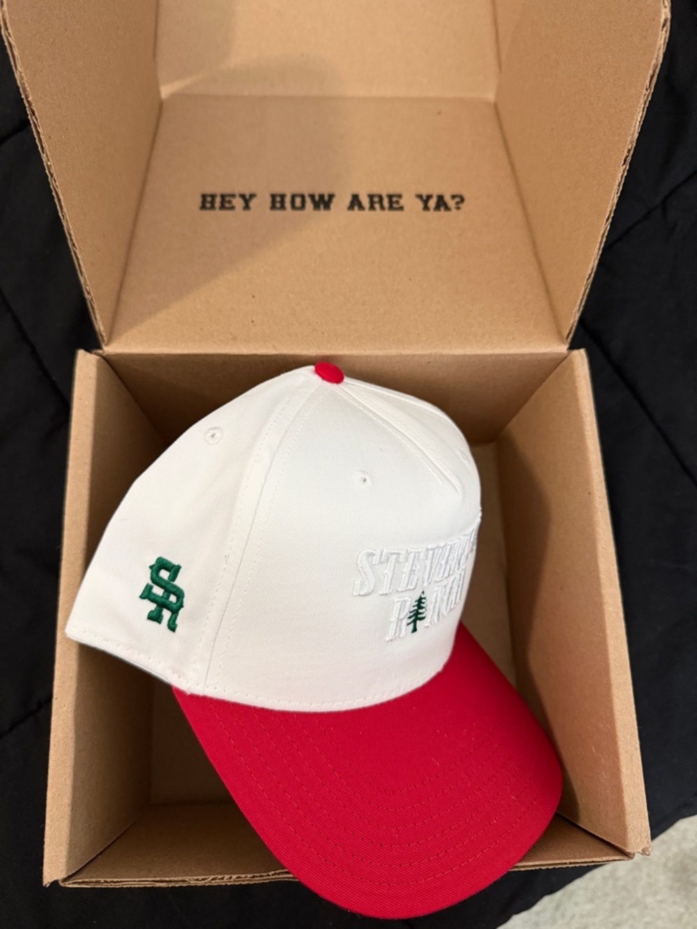 Stevenson Ranch (mike.) - White & Red Baseball Cap with Green Embroidered Logo